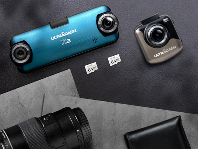 The_car_recorder_and_memory_card_are_placed_on_a_black_leather_table